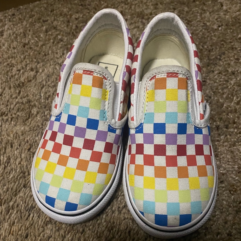 Toddler size 9 rainbow checkered slip on Vans. Never been worn.